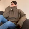 Suéter de punto de cuello alto de color liso para exportación transfronteriza para mujer, estilo europeo y americano, otoño e invierno, suelto y versátil, tejido clásico de estilo perezoso holgado y con efecto adelgazante