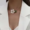 Estilo Dulce Fresco Collar con Puntadas de Flor Blanca para Mujer Super Hada Luz de Lujo Elegante Cadena para Clavícula Versátil Diseño de Nicho Primera Joyería