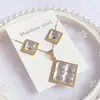 Nuevo especial transfronterizo explosión de tendencia europea y americana titanio acero alta calidad color collar pendientes traje femenino joyería de concha real