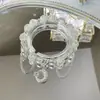 Arcoíris de verano ~ pulsera de nicho de color pequeño y fresco dopamina pulsera elástica de alta gama para mujer de verano al por mayor