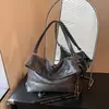 Bolso de mano retro de gran capacidad, nuevo estilo 2026, bolso de hombro versátil para mujer para el trabajo, bolso casual de moda, bolso hobo de moda