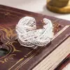 Anillo trenzado de cuentas entrelazadas plateadas vintage nuevo para mujer, diseño de nicho, anillo para el dedo índice, anillo único de alta gama