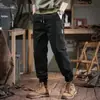 Calças de ferramentas retrô pesadas estilo americano masculinas primavera e outono novas calças casuais soltas de todas as combinações da marca da moda de cor sólida