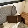 Bolso vintage de gamuza para mujer, nueva moda de otoño 2026, bolso tote de alta gama para el trabajo, bolso de hombro de gran capacidad