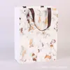 Bolsas de Papel sin Cintura con Diseño Geométrico del Fabricante, Bolsas de Compra de Regalo de Boutique de Alta Gama, En Stock al por Mayor