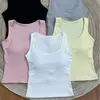 Camisole Versátil de Cor Sólida para o Início da Primavera com Bojos, Design Único para Usar por Cima, Top Curto Esportivo Slim-Fit com Costas Nadador