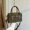 Bolso de gamuza para mujer, nuevo modelo de otoño 2026, bolso de mano vintage de alta gama para el día a día, exquisito bolso de hombro y cruzado