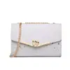 Bolsos 2025 Bolsos Nuevos para Mujer Otoño e Invierno Bolsos Cruzados de Moda Versátiles Tendencia Diseño de Nicho Cadena de Cuero Genuino Estilo Caliente Pequeño Cuadrado
