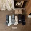 Directo del fabricante: Estilo Otoño KS208 Medias versátiles para niñas con lazo de pedrería, leggings de algodón peinado al por mayor