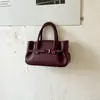 Bolso de mujer con patrón de lichi vintage para otoño e invierno 2026 nuevo bolso de mano de nicho de moda bolso tote bolso cruzado versátil