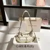 Bolsa de Hombro Acolchada Estilo Pequeño Fragante Dropshipping 2025 Nueva Bolsa de Cadena de Alta Gama para el Brazo Venta al por Mayor