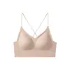 Nuevo sujetador sin costuras color piel con tirantes finos, copas fijas y un gran diseño de espalda abierta, con espalda cruzada y estilo halter, lo que lo convierte en un sujetador invisible.