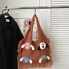 2025 Nuevo Bolso de Mujer Tejido Versátil de Hombro Único de Punto Popular de Comercio Exterior Otoño e Invierno con Bloques de Color Artísticos y Borlas