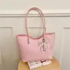 2026 Bolso de mano tejido nuevo con lazo de encaje de perlas, gran capacidad, bandolera, estilo coreano, bolso de mano para el día a día