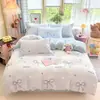 Nuevo juego de ropa de cama de cuatro piezas de terciopelo de leche con estampado de dibujos animados, que incluye una funda de edredón y una sábana bajera, con vellón añadido para mayor calidez, perfecto para usar en invierno en dormitorios