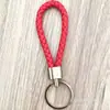 Llavero de cuerda de cuero trenzado simple creativo colgante de muñeca linda accesorios de llave para parejas tendencia regalos pequeños venta al por mayor