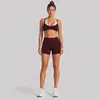 Conjunto de ropa de yoga para mujer transfronterizo con lunares de color contrastante, sujetador deportivo de cuello halter, conjunto de shorts de ciclismo al aire libre para fitness de secado rápido