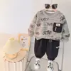 Conjunto de Ropa de Otoño para Niños 2026 Ropa Nueva de Primavera y Otoño Ropa Infantil para Bebés Sudadera Casual de Bebé Conjunto de Dos Piezas Moderno Venta al por Mayor