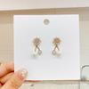 Pendientes de perlas explosivas de lujo ligeros y combinables para mujer, pendientes sencillos y personalizados de estilo frío sin orejas, pendientes elegantes de moda para el verano.