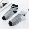 Meias Masculinas Embaladas Individualmente Meias de Algodão Cor Sólida Meias de Cano Médio Simples Respiráveis Meias Esportivas Fabricante Atacado Meias de Barraca