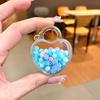Cuentas de color copo de nieve azul paleta botella acrílica arenas movedizas luminosas venta al por mayor colgante creativo aceite Mickey accesorios