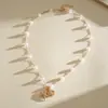 Collar Cruzado Transfronterizo Europeo y Americano Estilo Marino de Estrella de Mar, Flor y Perla, Cadena para Clavícula de Metal Moderno, Joyería de Nicho de Alta Gama para Mujeres
