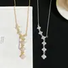 Elegante y lujoso collar de trébol de seis hojas estilo coreano para mujer, cadena para la clavícula con borla moderna y versátil, accesorio transfronterizo más vendido