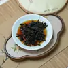 Chá Pu 'er maduro Islândia rima pura 357g bolo de chá direto da fábrica Yunnan árvore antiga envelhecido maduro Pu 'er chá atacado
