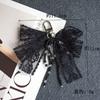 Tridimensional arco arco placa sapatos decorativo pérola corda DIY nicho design pérola renda arco pendurado telefone móvel corrente