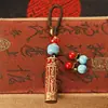 Llavero de tarro con mantra Lingyagn de aceite rojo, tarro hueco de latón puro con sutra, se puede abrir para guardar sutras, colgante de cuerda trenzada hecho a mano