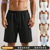 Pantalones Cortos Deportivos Casuales Sueltos con Cordón TK para Hombre Color Sólido Jacquard Tridimensional Texturizado Pantalón de Cinco Puntos