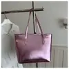 Bolso de moda de gran capacidad para mujer, nueva versión coreana 2026, bolso de mano liso simple, bolso tote versátil para el día a día