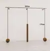 Estante de ropa de acero inoxidable montado en la pared para tienda de ropa, estante vintage color veta de madera de nogal, exhibidor de piso para ropa de mujer