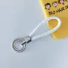 Chaveiro de corda trançada com anel duplo chaveiro de couro PU colorido novo pingente para bolsa feminina chaveiro para pendurar na cintura