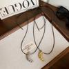 Collar de Cordón de Cuero Negro Estilo Coreano Bolsa de Ganado para Mujer 2024 Nuevo Versátil Elegante Largo Cadena de Lana Cadena para Clavícula Accesorios