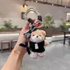 Calça de Couro Pelúcia Chaveiro de Boneca Urso Desenho Animado Criativo Boneca Laço Boneca Casal Pingente de Bolsa Melhor Amigo