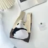 Bolsa de Mano de Celebridad de Internet 2024 Serie Panda Femenina Bolso de Mano a Juego Estudiante Moda Versión Coreana Nueva Bolsa Tejida