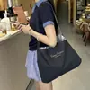 Bolso Cubo de Nicho Versión Coreana para Mujer Verano 2025 Nuevo Bolso de Tela Dopamina Colorido Bolso Cruzado Informal de Mezclilla