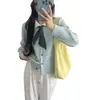 Cardigã de tricô com gola estilo francês para mulheres, nova coleção outono e inverno, estilo delicado com laço, suéter solto e macio, peça de outer wear feminina