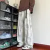 Pantalones casuales para hombre, estilo hip-hop americano, con un diseño de cinturón moderno, corte recto, adecuados para primavera y otoño, con una caída fluida, y disponibles en tallas grandes, con un estampado tie-dye.