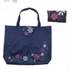 Fábrica para bolsa de mano impermeable de tela Oxford para regalos, bolsa de compras plegable de moda colorida con flores, bolsa de almacenamiento de protección ambiental portátil