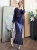 La popular falda plisada con textura de ácido acético de este año para mujer, nueva para primavera y otoño, de cintura alta, con abertura lateral, de longitud media, estilo sirena