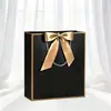 Embalagem Laço de Presente Sacola de Papel de Mão Sacola de Compras Pronta Exportação Transfronteiriça Impressão Logotipo Personalizado Fabricante Frete Grátis