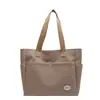 Bolsa Feminina Grande Capacidade Estilo Japonês 2023 Nova Bolsa Tote de Ombro para Estudante e Commuter Cor Sólida Versátil para Commuter