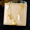 Colar Pingente Moda Coreana Simples Versátil Banhado a Ouro Irregular Oco Aço Inoxidável Coração Caranguejo Vieira Pérola