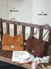 Bolso de mujer de piel genuina 2026 nuevo modelo bolso tote de ante y piel de vaca gran capacidad versátil bolso de hombro para el trabajo para mujer, exclusivamente para ventas transfronterizas