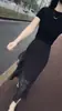 26198 Nova Daimai Yiuyuan Verão 2026 Nova Camiseta Simples de Gola Redonda com Manga Curta Saia Plissada com Bolinhas para Mulheres
