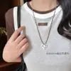Collar trenzado de corazón colorido de dopamina para mujer 2025 Nuevo lindo colgante largo de cadena para suéter halter Accesorios