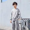 Conjunto Infantil Xia Ke Xiong Outono Conjunto de Duas Peças com Moletom e Calça para Meninos Roupas de Outono para Meninas Tricô Casual Roupas Infantis Atacado