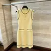 Foto Real do Vestido de Tricô Color Block Estilo Francês Sem Mangas de Seda Gelada Comprimento Médio Chique de Nanyou, Shenzhen